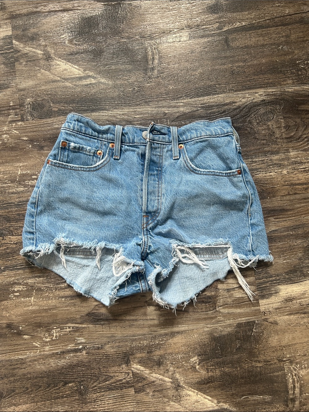 Levi's Light Wash Frayed Denim Cutoff Shorts